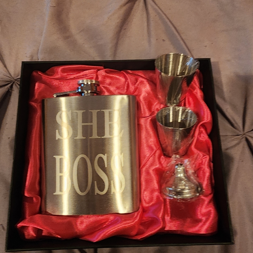 Engraved flask with two shot glasses. Items have never been used.